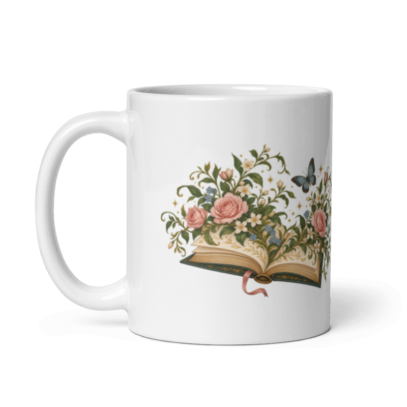 white glossy 11 oz ceramic mug with the Where Stories Bloom open book, roses and butterfly illustration, handle on the left