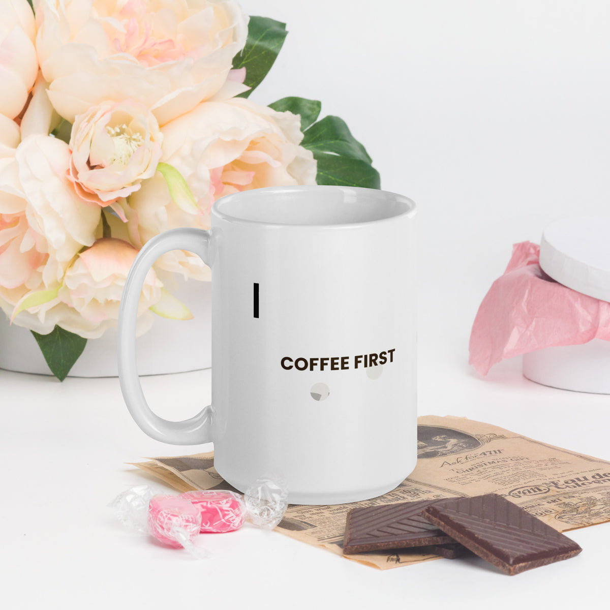 White ceramic mug with the Coffee First design, 15 oz, with the handle on the left